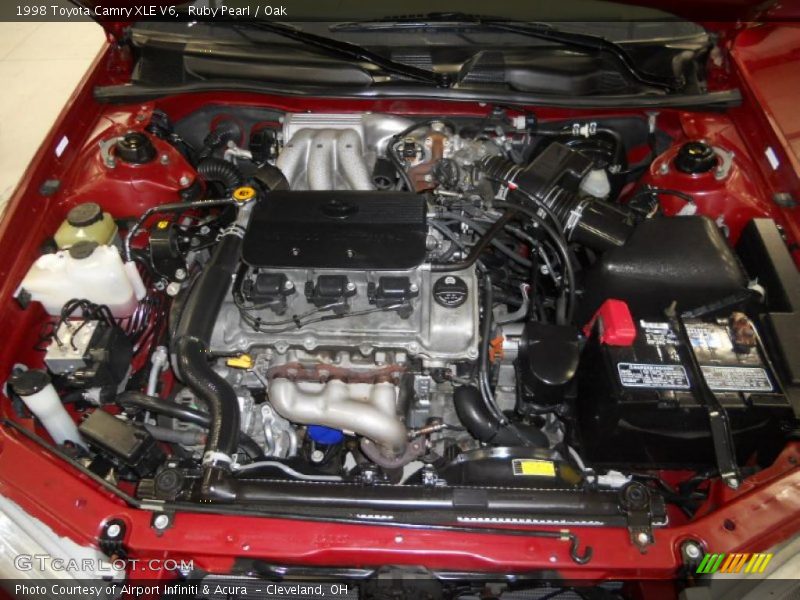 Ruby Pearl / Oak 1998 Toyota Camry XLE V6