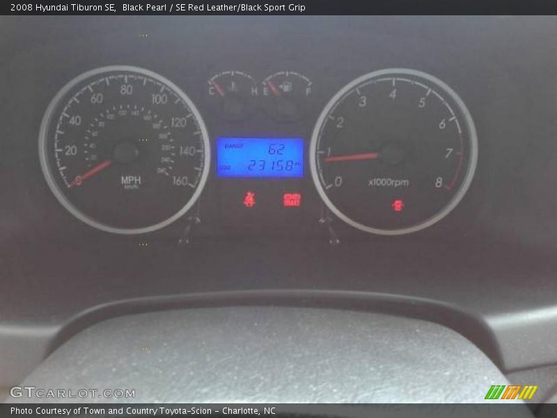 Black Pearl / SE Red Leather/Black Sport Grip 2008 Hyundai Tiburon SE