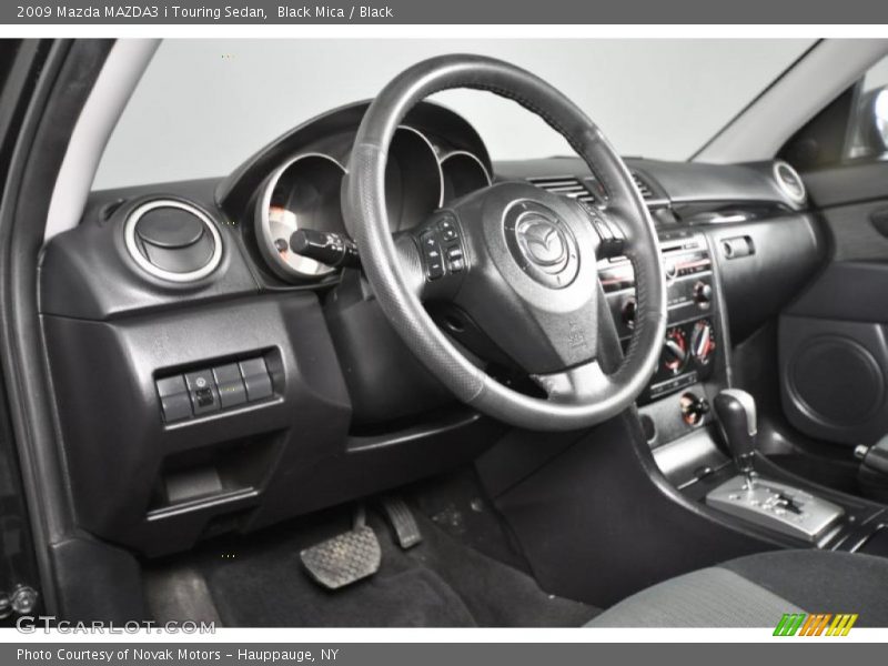 Black Mica / Black 2009 Mazda MAZDA3 i Touring Sedan