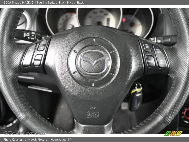 Black Mica / Black 2009 Mazda MAZDA3 i Touring Sedan