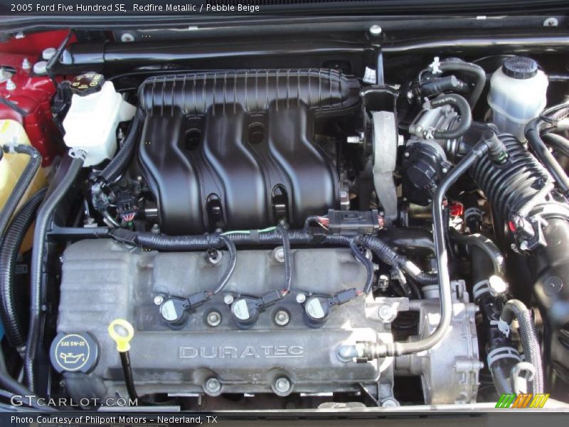 Redfire Metallic / Pebble Beige 2005 Ford Five Hundred SE