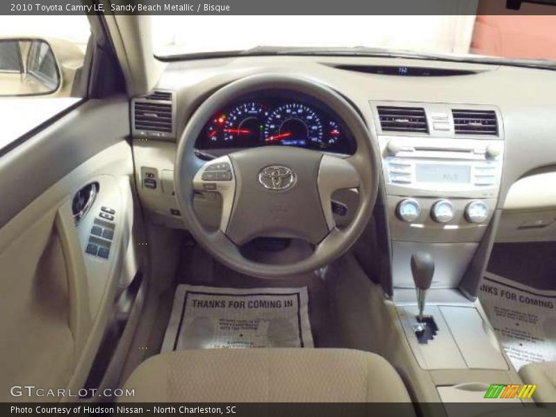 Sandy Beach Metallic / Bisque 2010 Toyota Camry LE