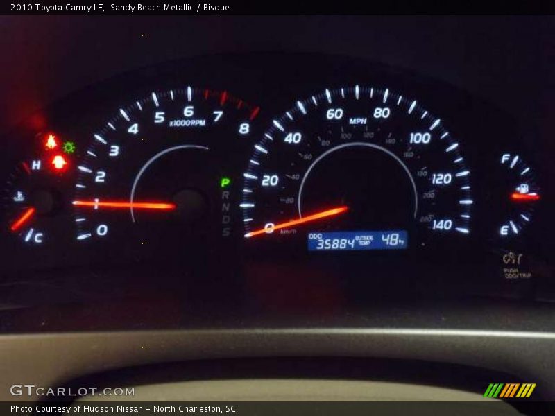 Sandy Beach Metallic / Bisque 2010 Toyota Camry LE