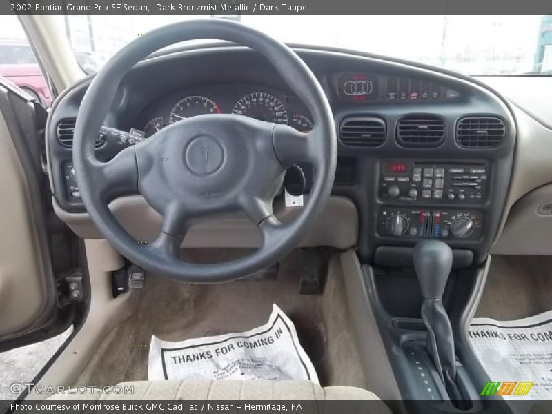 Dark Bronzmist Metallic / Dark Taupe 2002 Pontiac Grand Prix SE Sedan