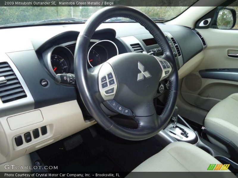 Manitoba Green Metallic / Beige 2009 Mitsubishi Outlander SE