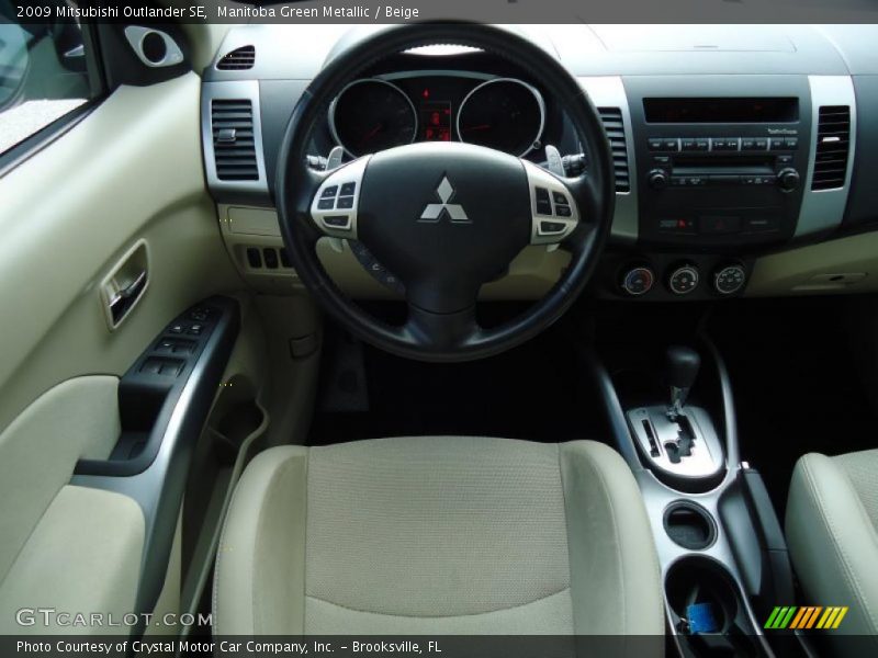 Manitoba Green Metallic / Beige 2009 Mitsubishi Outlander SE
