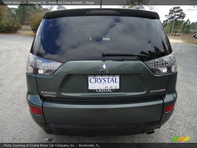 Manitoba Green Metallic / Beige 2009 Mitsubishi Outlander SE