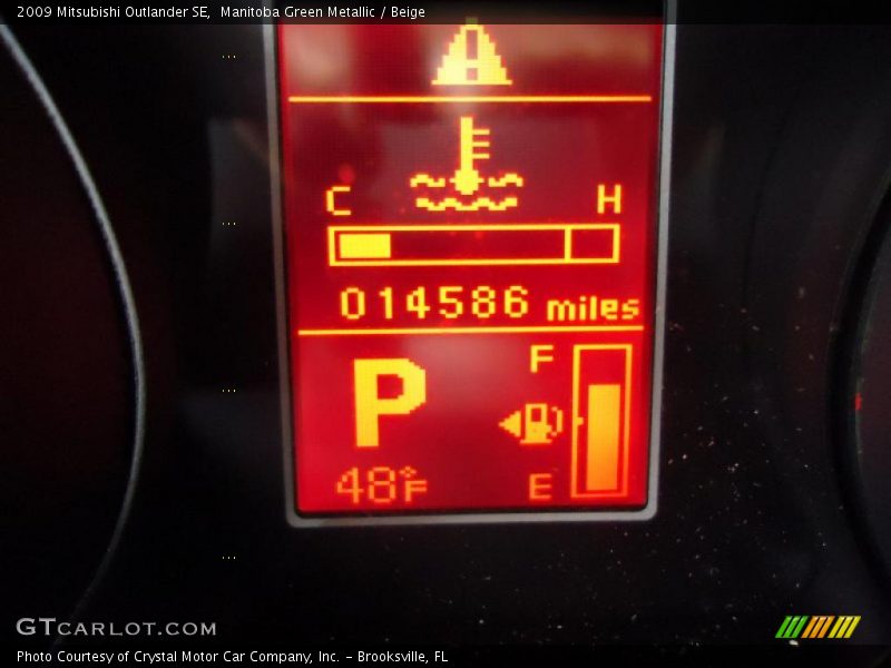 Manitoba Green Metallic / Beige 2009 Mitsubishi Outlander SE