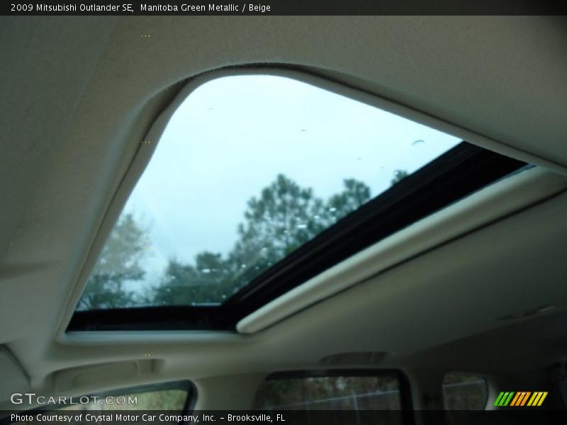 Manitoba Green Metallic / Beige 2009 Mitsubishi Outlander SE