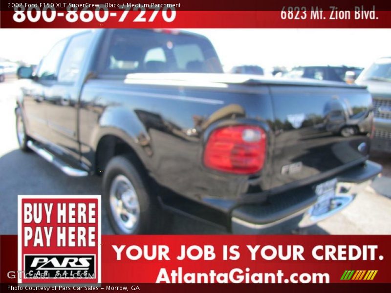 Black / Medium Parchment 2002 Ford F150 XLT SuperCrew