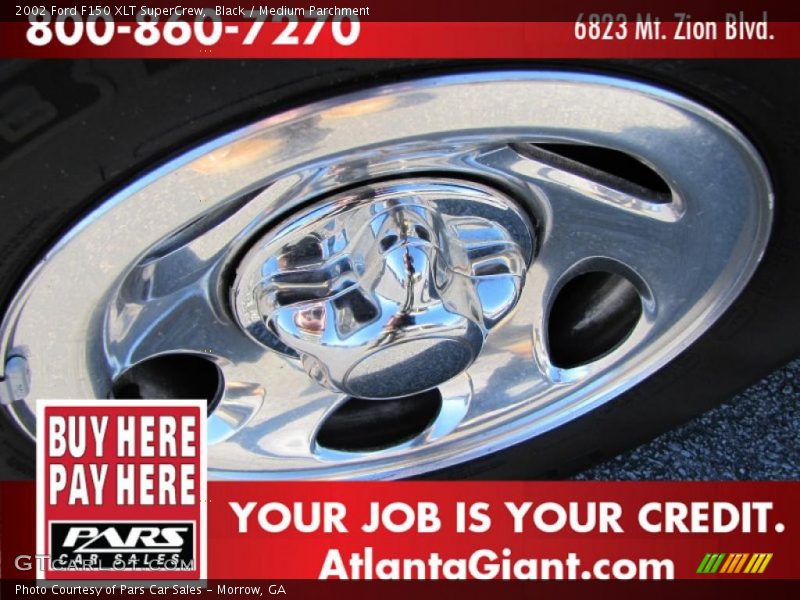 Black / Medium Parchment 2002 Ford F150 XLT SuperCrew