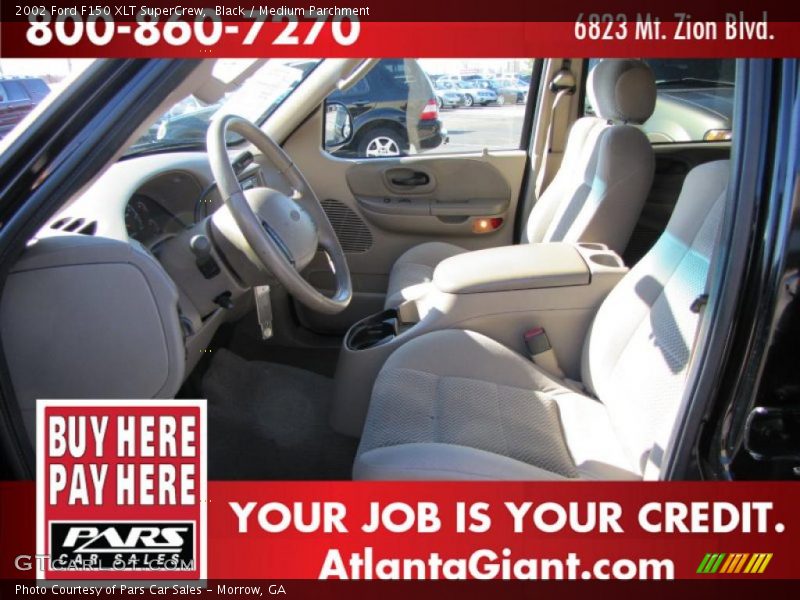 Black / Medium Parchment 2002 Ford F150 XLT SuperCrew