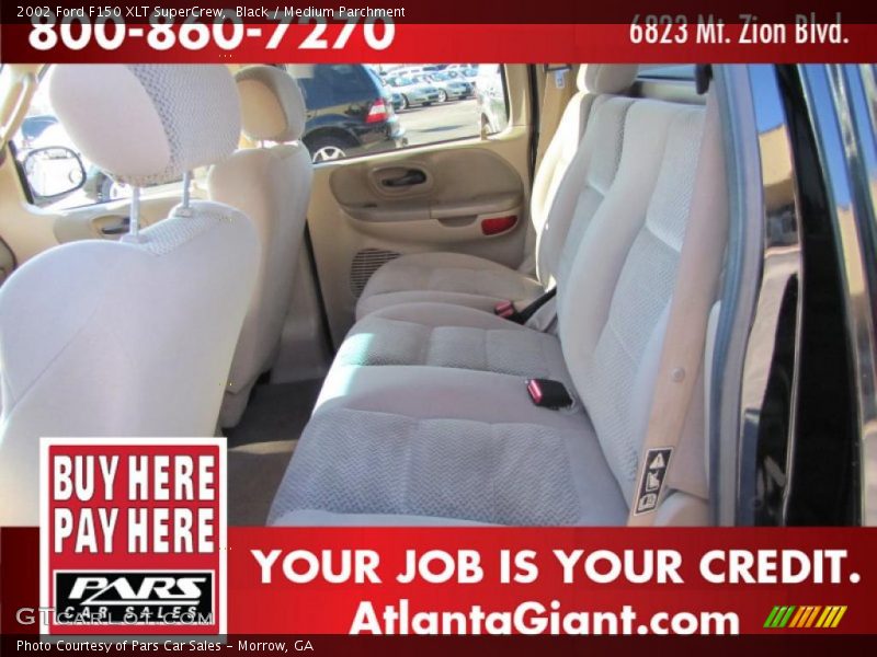 Black / Medium Parchment 2002 Ford F150 XLT SuperCrew