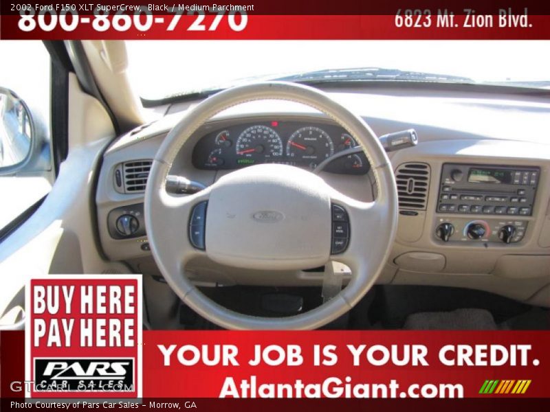 Black / Medium Parchment 2002 Ford F150 XLT SuperCrew