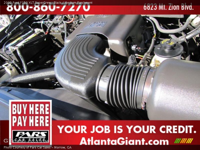 Black / Medium Parchment 2002 Ford F150 XLT SuperCrew