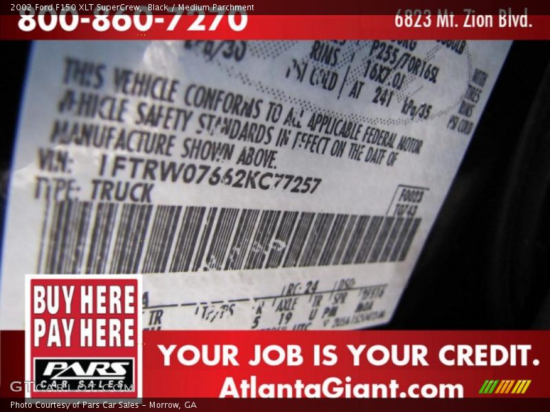 Black / Medium Parchment 2002 Ford F150 XLT SuperCrew