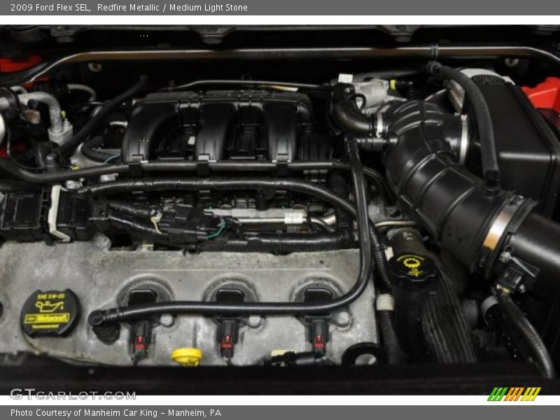 Redfire Metallic / Medium Light Stone 2009 Ford Flex SEL