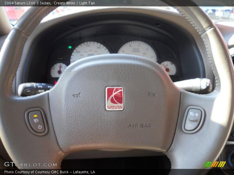 Cream White / Light Tan 2004 Saturn L300 3 Sedan