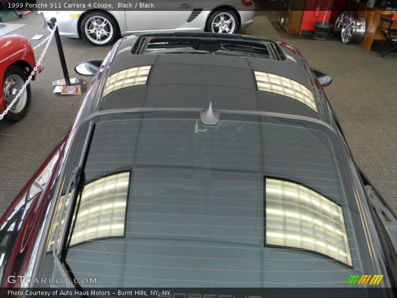 Black / Black 1999 Porsche 911 Carrera 4 Coupe