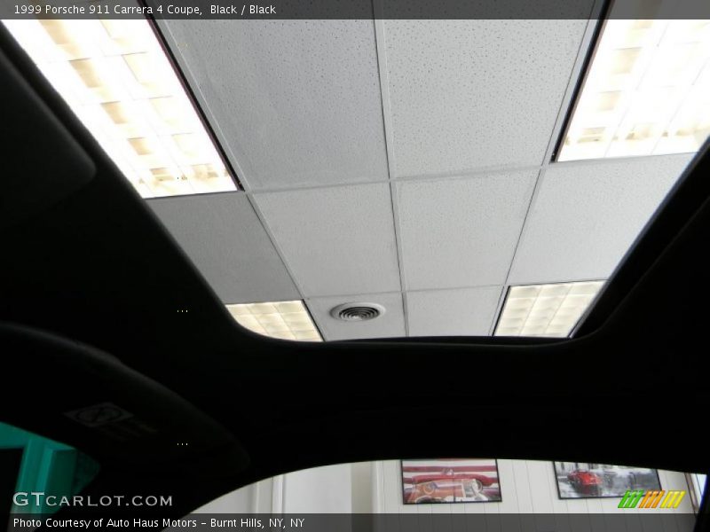 Black / Black 1999 Porsche 911 Carrera 4 Coupe