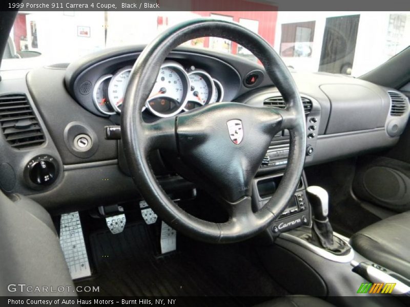 Black / Black 1999 Porsche 911 Carrera 4 Coupe