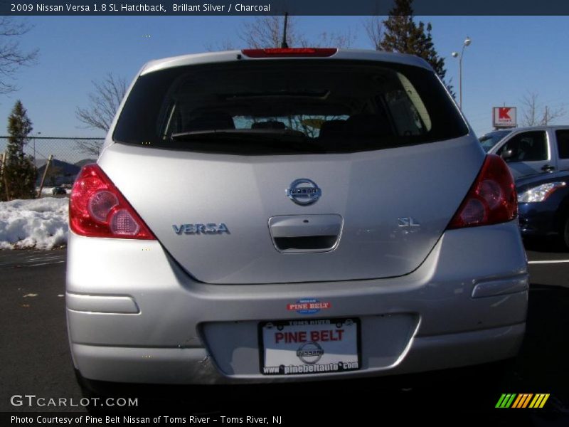 Brillant Silver / Charcoal 2009 Nissan Versa 1.8 SL Hatchback