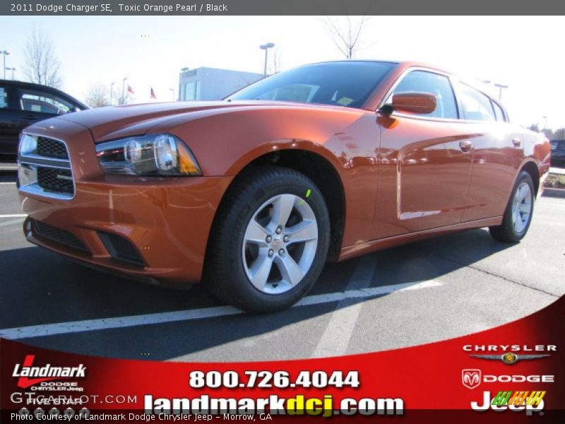 Toxic Orange Pearl / Black 2011 Dodge Charger SE