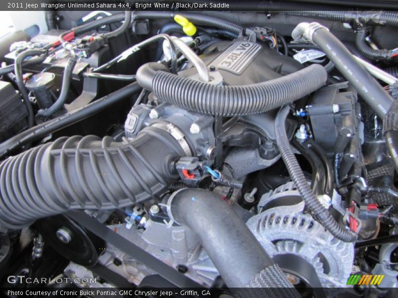 Bright White / Black/Dark Saddle 2011 Jeep Wrangler Unlimited Sahara 4x4