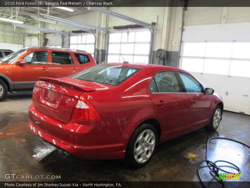 Sangria Red Metallic / Charcoal Black 2010 Ford Fusion SE