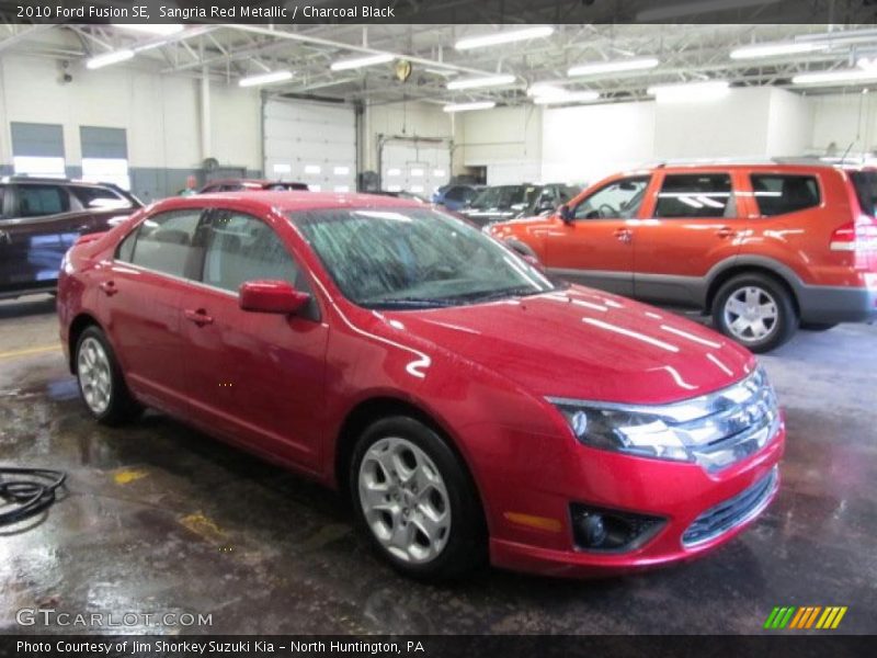 Sangria Red Metallic / Charcoal Black 2010 Ford Fusion SE