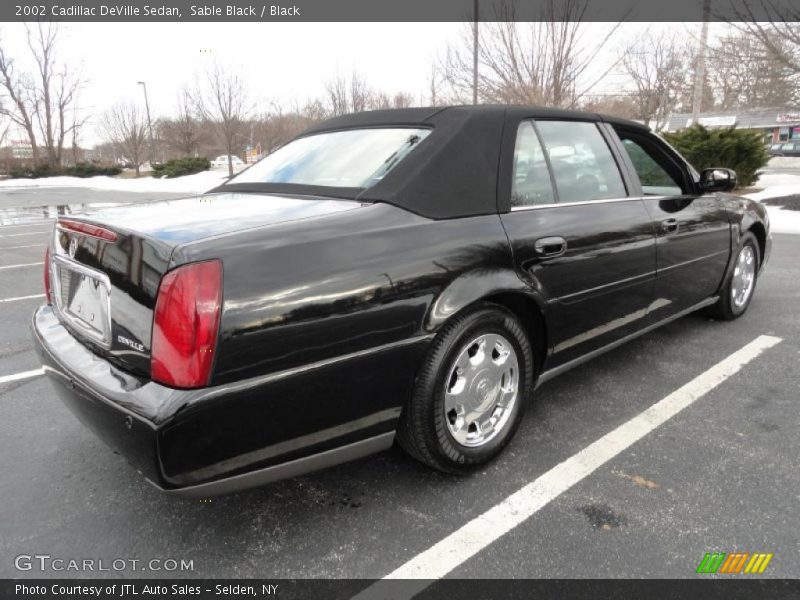 Sable Black / Black 2002 Cadillac DeVille Sedan