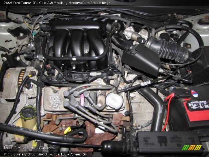 Gold Ash Metallic / Medium/Dark Pebble Beige 2006 Ford Taurus SE