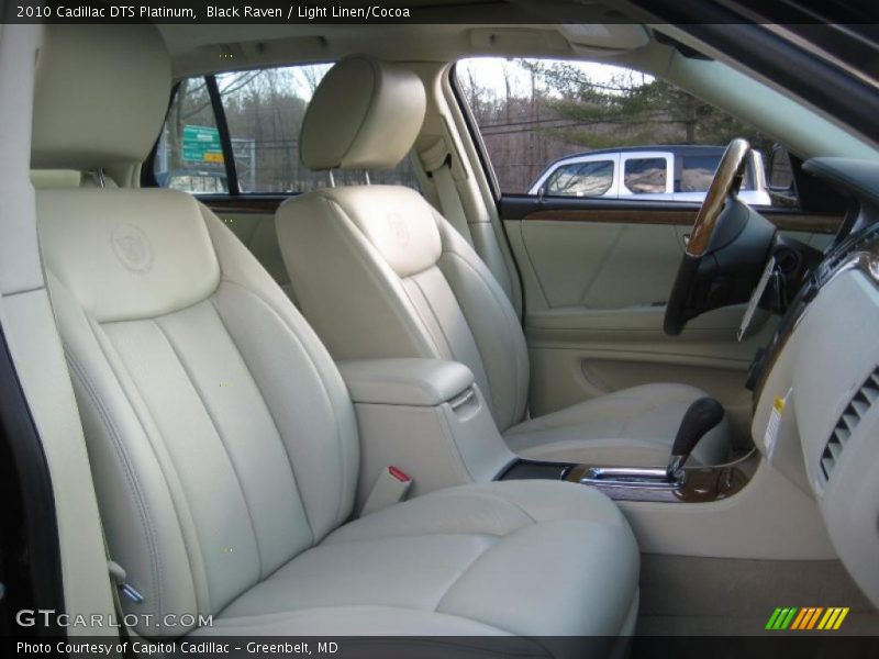  2010 DTS Platinum Light Linen/Cocoa Interior