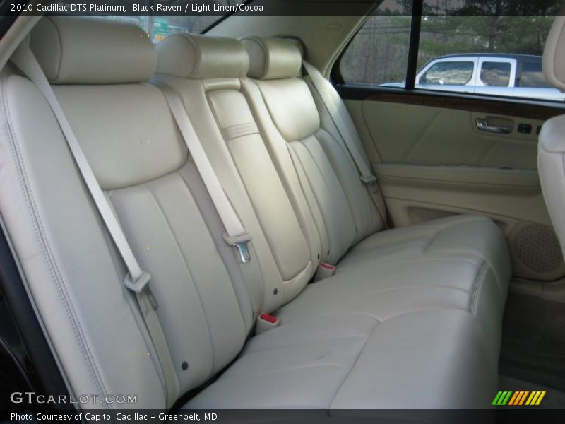  2010 DTS Platinum Light Linen/Cocoa Interior