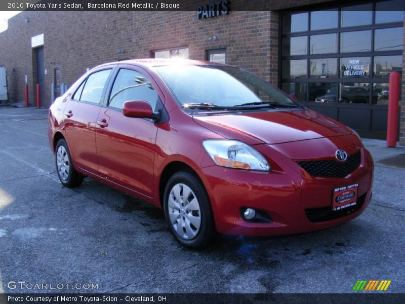 Barcelona Red Metallic / Bisque 2010 Toyota Yaris Sedan