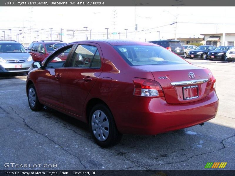 Barcelona Red Metallic / Bisque 2010 Toyota Yaris Sedan