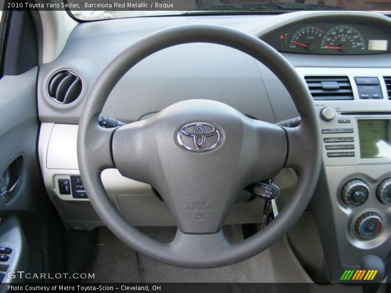 Barcelona Red Metallic / Bisque 2010 Toyota Yaris Sedan