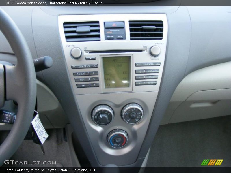 Barcelona Red Metallic / Bisque 2010 Toyota Yaris Sedan