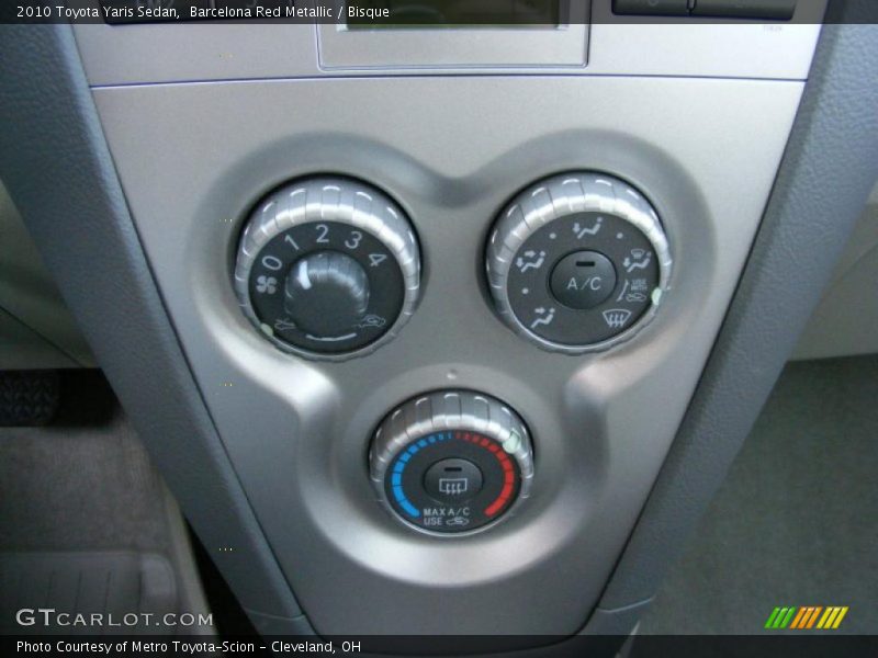 Barcelona Red Metallic / Bisque 2010 Toyota Yaris Sedan