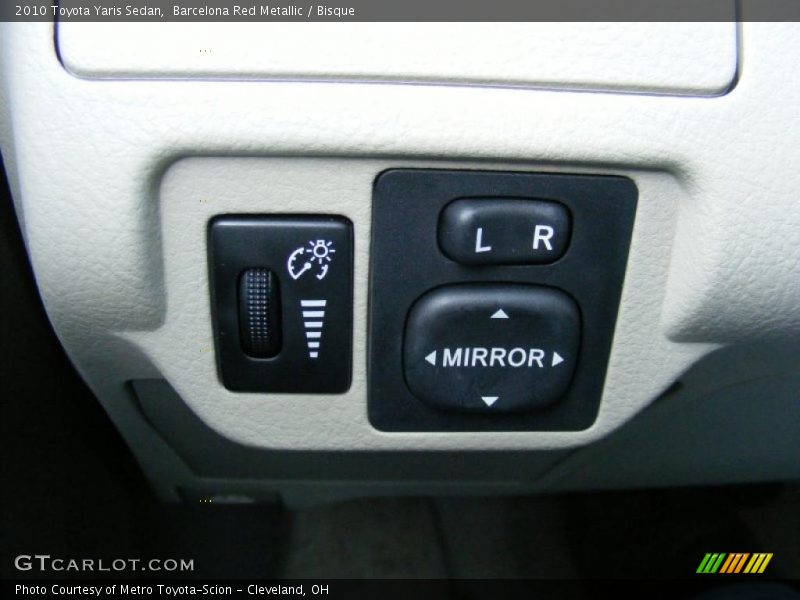 Barcelona Red Metallic / Bisque 2010 Toyota Yaris Sedan