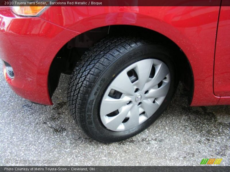 Barcelona Red Metallic / Bisque 2010 Toyota Yaris Sedan