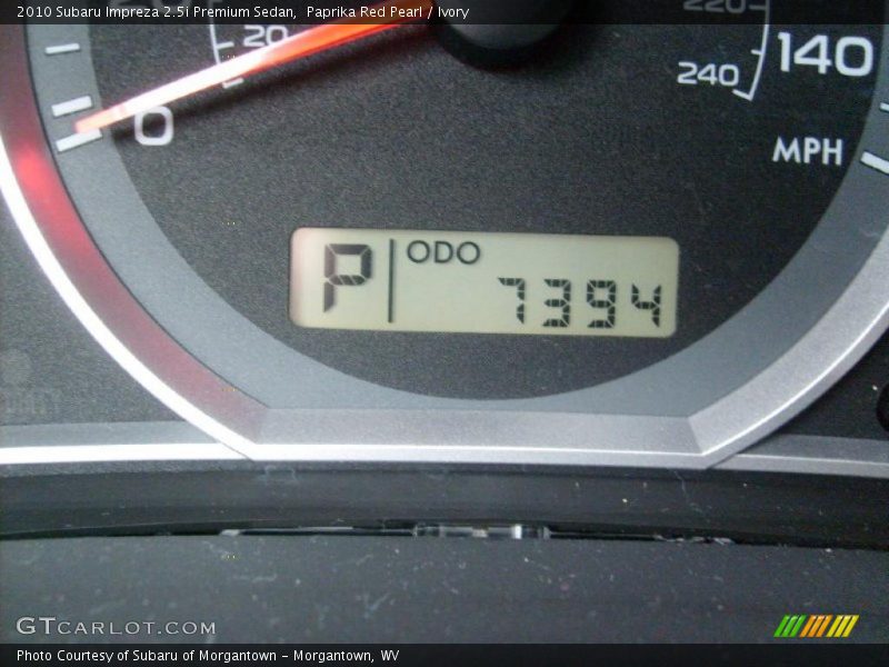 Paprika Red Pearl / Ivory 2010 Subaru Impreza 2.5i Premium Sedan