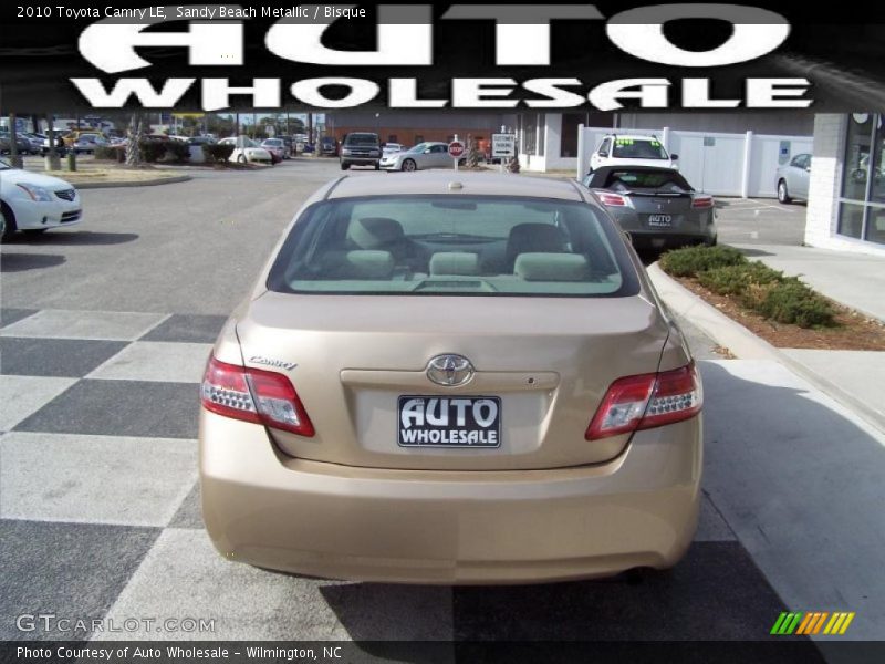 Sandy Beach Metallic / Bisque 2010 Toyota Camry LE