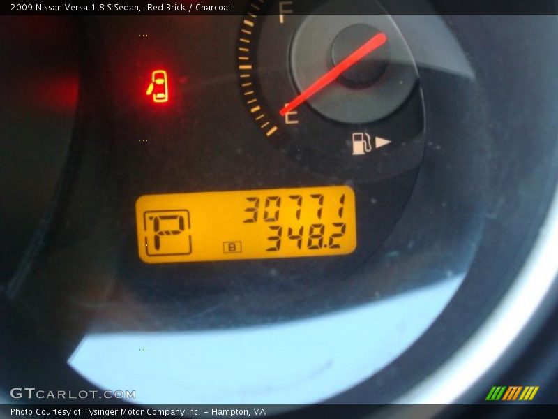Red Brick / Charcoal 2009 Nissan Versa 1.8 S Sedan