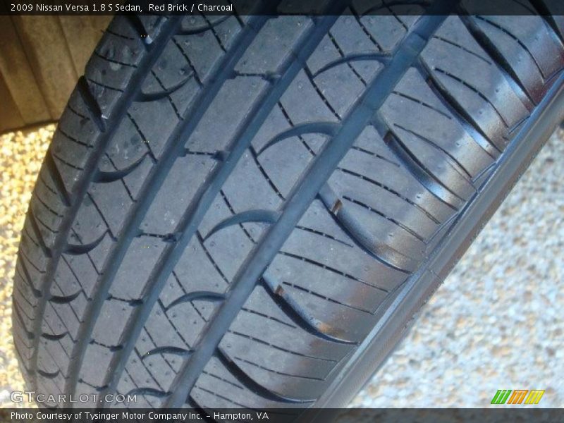 Red Brick / Charcoal 2009 Nissan Versa 1.8 S Sedan