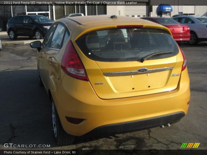 Yellow Blaze Metallic Tri-Coat / Charcoal Black Leather 2011 Ford Fiesta SES Hatchback