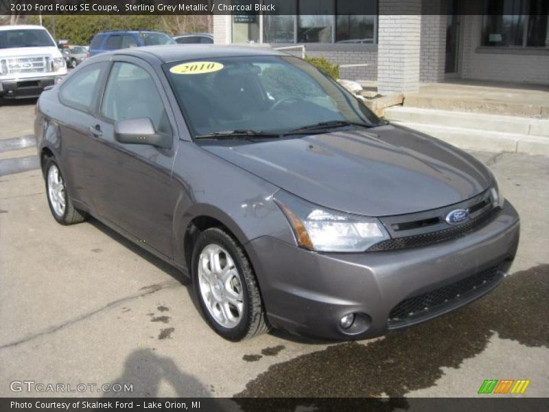Sterling Grey Metallic / Charcoal Black 2010 Ford Focus SE Coupe