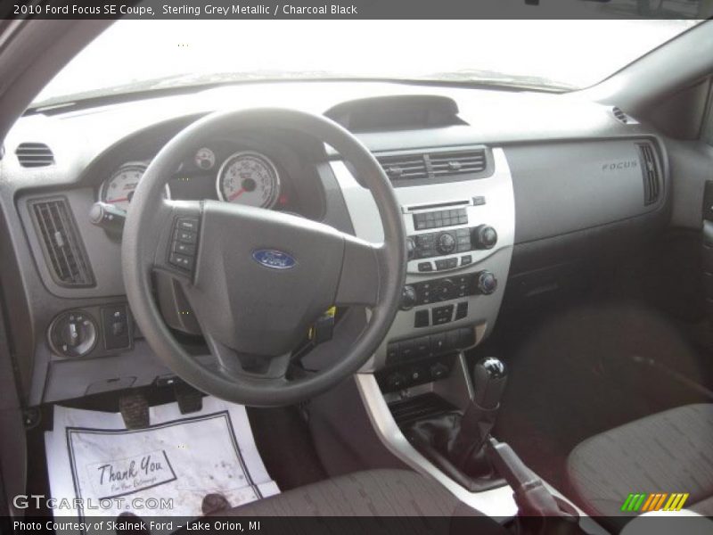 Sterling Grey Metallic / Charcoal Black 2010 Ford Focus SE Coupe