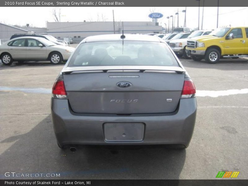 Sterling Grey Metallic / Charcoal Black 2010 Ford Focus SE Coupe