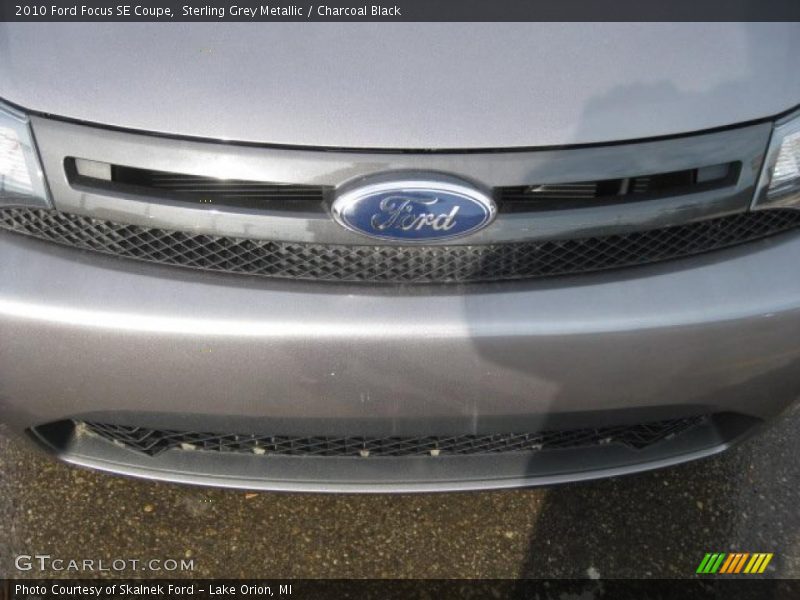 Sterling Grey Metallic / Charcoal Black 2010 Ford Focus SE Coupe